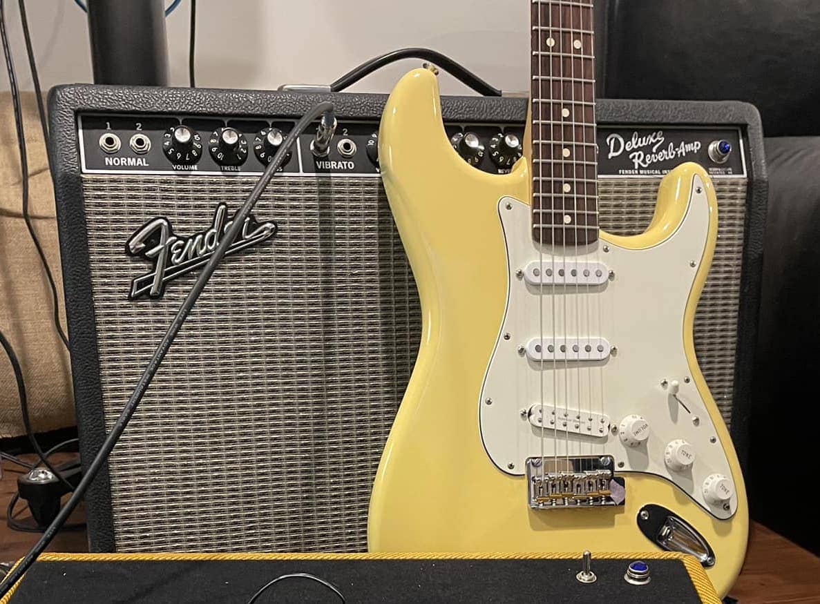 Fender '65 Deluxe Reverb next to a Strat
